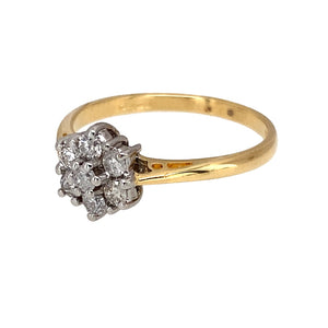 Preowned 18ct Yellow and White Gold & Diamond Set Flower Cluster Ring in size K with the weight 2.10 grams. The front of the ring is 8mm high and the ring contains approximately 25pt of diamond content in total