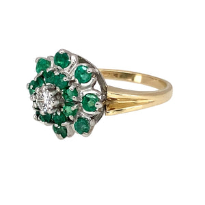Preowned 9ct Yellow and White Gold Diamond & Emerald Set Cluster Ring in size I with the weight 3 grams. The front of the ring is 13mm high