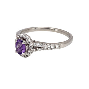 Preowned 18ct White Gold Diamond & Amethyst Set Halo Ring in size N with the weight 2.80 grams. The amethyst stone is 5mm by 4mm and there is approximately 21pt of diamond content in total