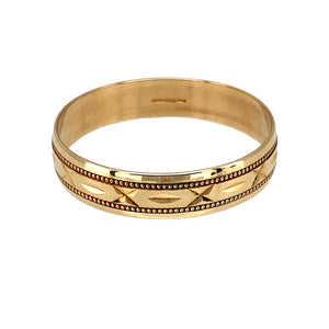 Preowned 9ct Yellow Gold Patterned 4mm Wedding Band Ring in size Q with the weight 1.30 grams