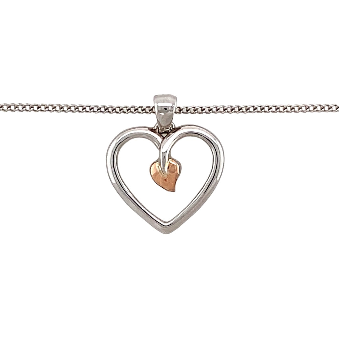 Preowned 925 Silver with 9ct Rose Gold Clogau Tree of Life Heart Pendant on an 18" - 22" adjustable Clogau curb chain with the weight 4.40 grams. The pendant is 2.2cm long including the bail
