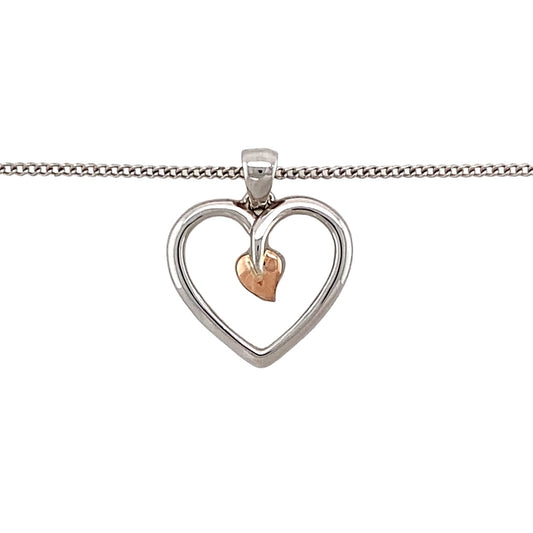 Preowned 925 Silver with 9ct Rose Gold Clogau Tree of Life Heart Pendant on an 18" - 22" adjustable Clogau curb chain with the weight 4.40 grams. The pendant is 2.2cm long including the bail