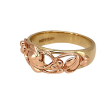 Load image into Gallery viewer, Add symbolic elegance and rich heritage to your collection with this pre-owned 9ct yellow and rose gold Clogau Tree of Life ring—bold, meaningful, and beautifully crafted.

Design: The ring features the iconic Tree of Life motif across the 9mm high front, with flowing vine and leaf detailing symbolising growth, strength, and renewal.
Material: Made from 9-carat yellow and rose gold, the polished finish highlights the intricate design and the warm contrast between the two precious metals.

