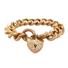 Load image into Gallery viewer, Preowned 9ct Rose Gold Patterned Heart Padlock 7&quot; Charm Bracelet with the weight 37.50 grams and link width 15mm. The heart padlock is approximately 1.7cm by 2.7cm
