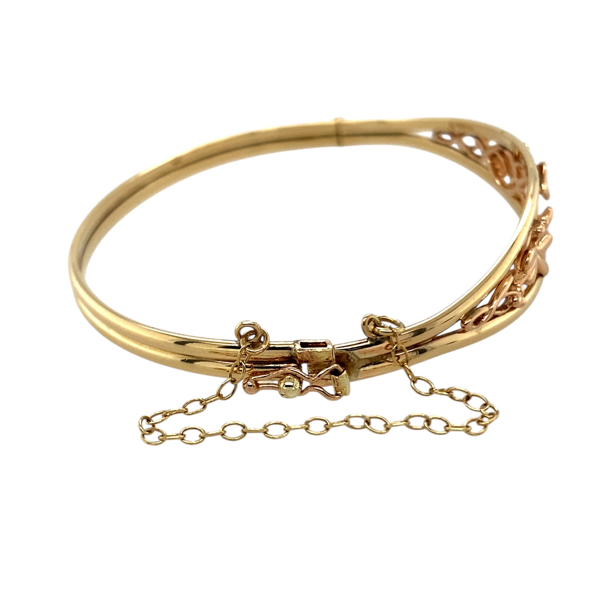 Celebrate growth, heritage, and elegance with this pre-owned 9ct yellow and rose gold Clogau Tree of Life bangle—rich in symbolism and beautifully crafted.

Design: The bangle features the iconic Tree of Life motif across the 12mm high front, blending yellow and rare Welsh rose gold in a flowing, organic design that symbolises growth, strength, and connection.
Material: Made from 9-carat yellow and rose gold, the polished finish highlights the detailed craftsmanship and warm two-tone contrast.
