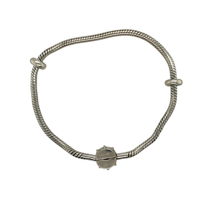 Preowned 925 Silver & 9ct Clogau Rose Gold Clogau Crown Charm Bracelet with the weight 16.60 grams. The crown clasp is 11mm diameter