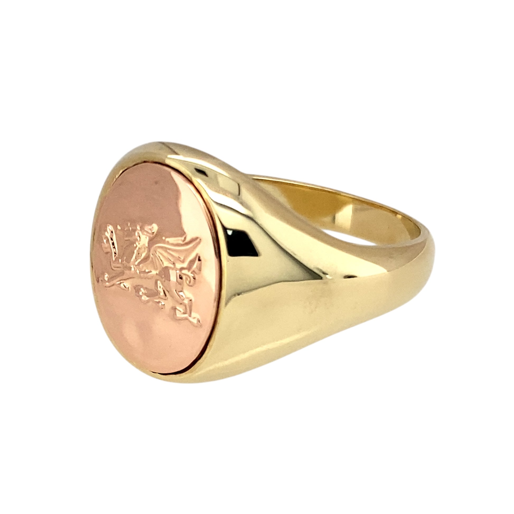 Preowned 9ct Yellow and Rose Gold Clogau Welsh Dragon Oval Signet Ring in size X with the weight 13.10 grams. The front of the ring is 17mm high