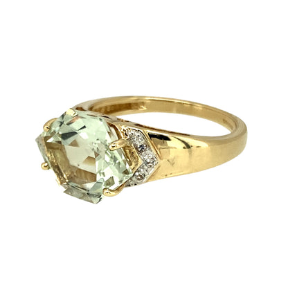 Preowned 9ct Yellow and White Gold Light Green & Cubic Zirconia Set Dress Ring in size N with the weight 4 grams. The light green/aqua coloured stone is 10mm by 13mm