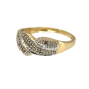 Preowned 9ct Yellow and White Gold & Diamond Set Wave Band Ring in size P with the weight 2.70 grams. The front of the band is 8mm wide
