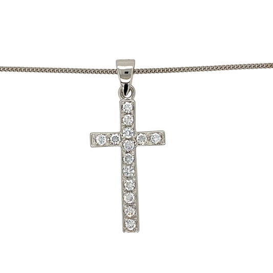 Add a touch of elegance and faith to your jewellery collection with this pre-owned 9ct white gold &amp; cubic zirconia set cross pendant necklace, featuring:

Design: A classic cross pendant, adorned with sparkling cubic zirconia for a refined and meaningful look.
Material: 9-carat white gold, offering a sleek and timeless appeal.
Gemstones: Set with cubic zirconia, adding brilliance and elegance.
Size &amp; Weight: The pendant measures 4cm long including the bail, with a solid weight of 7.30 grams