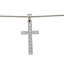 Load image into Gallery viewer, Add a touch of elegance and faith to your jewellery collection with this pre-owned 9ct white gold &amp; cubic zirconia set cross pendant necklace, featuring:

Design: A classic cross pendant, adorned with sparkling cubic zirconia for a refined and meaningful look.
Material: 9-carat white gold, offering a sleek and timeless appeal.
Gemstones: Set with cubic zirconia, adding brilliance and elegance.
Size &amp; Weight: The pendant measures 4cm long including the bail, with a solid weight of 7.30 grams
