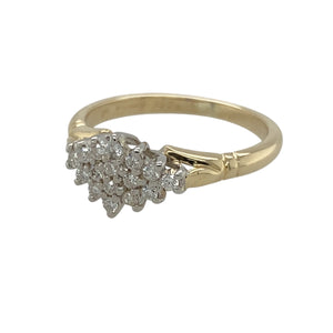 Add a touch of sparkle and sophistication to your jewellery collection with this pre-owned 9ct yellow gold & diamond set cluster ring, featuring:

Design: A timeless cluster-style setting, enhancing the brilliance of the diamonds.
Material: 9-carat yellow gold, with white gold settings to maximise the diamonds' radiance.
Gemstone Detail: Set with approximately 0.20ct total diamond content, adding elegance and charm.
Ring Front: Measures 7mm high, creating a refined yet eye-catching look.
