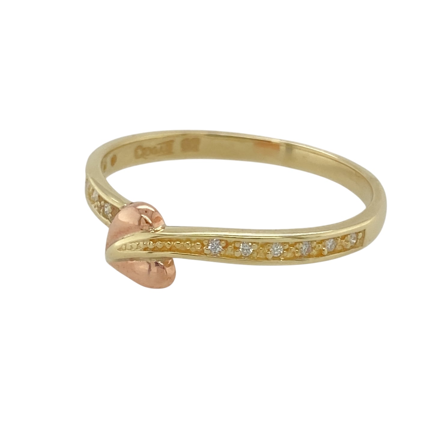 Add a meaningful and elegant piece to your collection with this pre-owned 9ct yellow and rose gold & diamond set Clogau Tree of Life band ring, featuring:

Design: The iconic Tree of Life motif, symbolising growth, strength, and connection across generations.
Material: A combination of 9-carat yellow and rose gold, showcasing Clogau’s signature warm tones.
Gemstone Detail: Accented with sparkling diamonds, adding a refined touch of brilliance.
Dimensions: The front of the band measures 5mm high, with a 2mm 