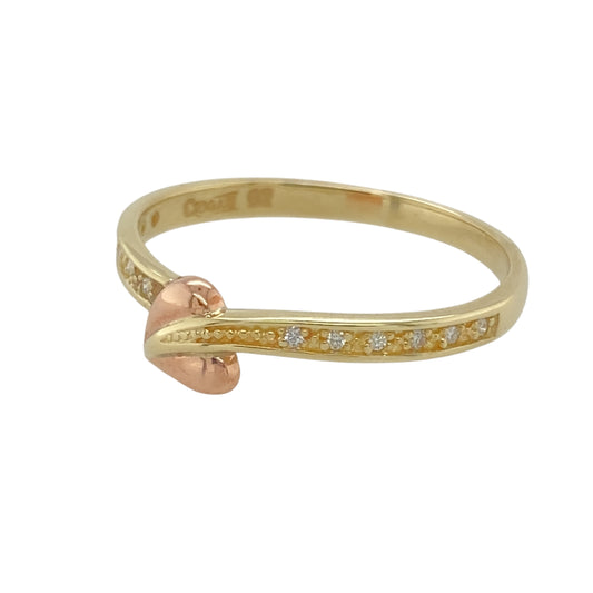 Add a meaningful and elegant piece to your collection with this pre-owned 9ct yellow and rose gold & diamond set Clogau Tree of Life band ring, featuring:

Design: The iconic Tree of Life motif, symbolising growth, strength, and connection across generations.
Material: A combination of 9-carat yellow and rose gold, showcasing Clogau’s signature warm tones.
Gemstone Detail: Accented with sparkling diamonds, adding a refined touch of brilliance.
Dimensions: The front of the band measures 5mm high, with a 2mm 