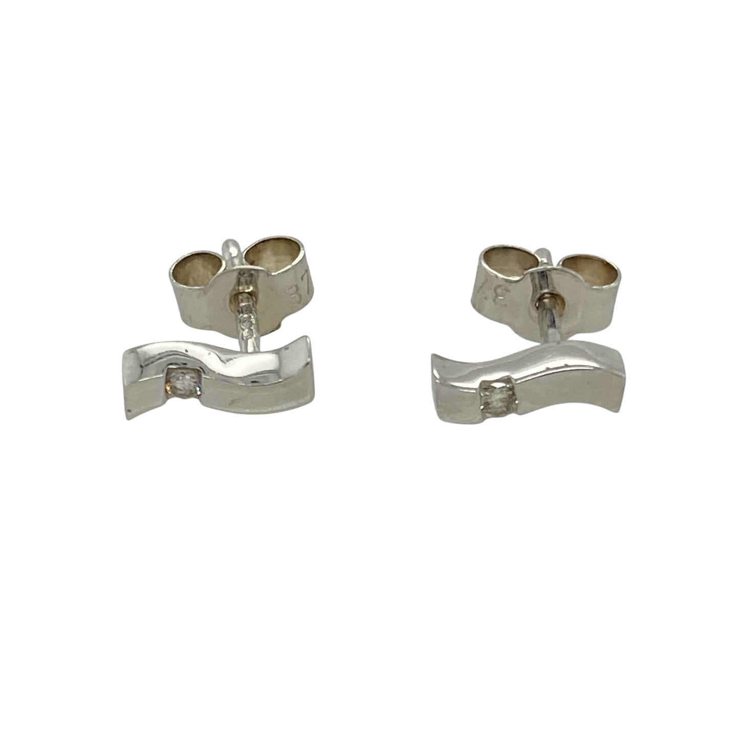 Add a touch of modern elegance to your jewellery collection with these pre-owned 9ct white gold and diamond set wave stud earrings, featuring:

Design: Sleek wave-shaped studs accented with sparkling diamonds, offering a contemporary yet timeless style.
Material: 9-carat white gold, providing a cool-toned, polished finish that enhances the brilliance of the diamonds.
Gemstone Detail: Set with delicate diamonds that add subtle sparkle to the flowing design.

