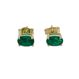 Add a rich splash of colour to your jewellery collection with these pre-owned 9ct yellow gold and green stone oval stud earrings, offering timeless elegance with a vibrant twist, featuring:

Design: A classic oval stud style, showcasing vivid green stones in a simple yet striking setting—perfect for everyday wear or special occasions.
Material: Crafted in 9-carat yellow gold, the warm tone of the setting beautifully contrasts with the deep emerald-like hue of the stones.
