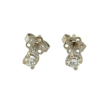 Load image into Gallery viewer, Add timeless sparkle to your jewellery collection with these pre-owned 9ct white gold diamond set stud earrings, offering understated elegance and everyday brilliance:

Design: A classic stud style featuring a single diamond in each earring, perfect for adding subtle sparkle and versatile sophistication to any look.
Material: Crafted from 9-carat white gold, the polished setting enhances the natural brilliance of the diamonds and complements their clean, timeless appeal.

