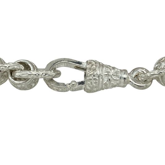 Add bold sophistication to your jewellery collection with this new 925 silver 8.5" patterned rollerball bracelet, offering substantial style and intricate detailing for a standout look:

Design: A classic rollerball link bracelet with patterned links, combining smooth, rounded elements with ornate detailing for a distinctive and eye-catching finish.
Material: Crafted from 925 sterling silver, the bracelet features a polished and textured finish that enhances its depth, style, and durability.