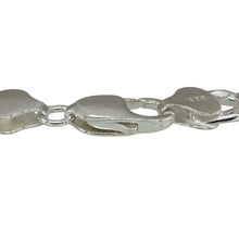 Load image into Gallery viewer, Make a strong statement with this new 925 silver 8.5&quot; curb bracelet, offering bold style and classic design in a substantial and eye-catching piece:

Design: A traditional curb link bracelet featuring broad, flat interlocking links, providing a sleek, powerful look with timeless appeal.
Material: Crafted from 925 sterling silver, the bracelet features a bright polished finish that enhances its clean lines and classic style.
