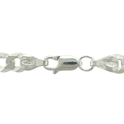 Add timeless strength and style to your collection with this new 925 silver 24" curb chain, a perfect balance of bold design and everyday versatility:

Design: A classic curb link chain with flat, interlocking links that offer a sleek, polished look and a smooth, flexible drape across the neckline.
Material: Crafted from 925 sterling silver, the chain features a bright, polished finish that enhances its clean, stylish appearance.
Dimensions: Measuring 24 inches in length with a 6mm link width