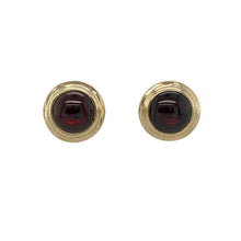 Load image into Gallery viewer, Bring rich, classic style to your collection with these pre-owned 9ct yellow gold and garnet cabochon set button stud earrings, offering timeless elegance perfect for everyday sophistication or special occasions.

Design: Each earring features a smooth, round garnet cabochon at the centre of a simple button-style setting, creating a bold yet refined look.
Material: Made from 9-carat yellow gold, the polished finish beautifully complements the deep, rich tones of the garnet stones.

