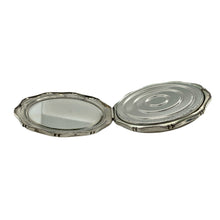 Load image into Gallery viewer, Bring vintage charm to your collection with this pre-owned 925 silver compact mirror, featuring an elegant patterned exterior and a timeless design perfect for gifting or personal use.

Design: The compact showcases a beautifully patterned outer surface, offering classic style with a touch of refinement.
Material: Made from 925 sterling silver, the polished and detailed finish enhances its decorative appeal while ensuring lasting quality.
Mirror Detail: This functional piece combines beauty
