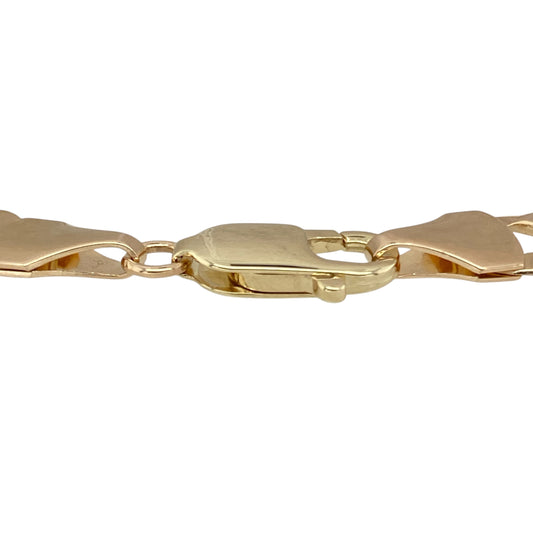 Bring bold sophistication to your collection with this pre-owned 9ct yellow gold 8.5" curb bracelet, offering a strong and timeless design that makes a confident statement—perfect for daily wear or standout styling.

Design: The bracelet features classic flat curb links, creating a sleek, interlocking pattern known for its strength and enduring appeal.
Material: Made from 9-carat yellow gold, the high-polish finish enhances the warm tone and crisp definition of each link.
