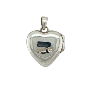 Bring heartfelt meaning and elegant detail to your collection with this pre-owned 925 silver with 9ct Clogau rose gold heart Tree of Life locket pendant, blending personal sentiment with timeless Welsh design—perfect for gifting or treasured keepsakes.

Design: The heart-shaped locket features Clogau’s signature Tree of Life motif in flowing rose gold vines across the front, symbolising growth, heritage, and connection. The locket opens to hold a photo or small memento close to the heart.