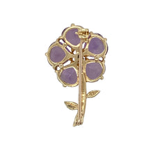 Load image into Gallery viewer, Add vintage-inspired charm and rich colour to your collection with this pre-owned 9ct yellow gold diamond and amethyst flower brooch—a striking design with elegant detail and timeless appeal.

Design: Shaped as a delicate flower, the brooch features three rounded triangle-shaped amethyst stones, each measuring 8mm by 8mm by 8mm, forming the petals. A single diamond at the centre adds a touch of sparkle to complete the floral design.
