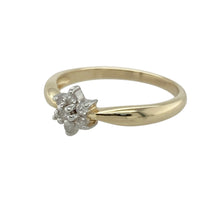 Load image into Gallery viewer, Delicate and full of charm, this pre-owned 9ct yellow gold diamond set flower cluster ring offers subtle sparkle and timeless femininity—perfect for everyday elegance or a thoughtful gift.

Design: The ring features a small flower-shaped cluster of diamonds, creating a classic floral motif with a soft and graceful presence.
Material: Made from 9-carat yellow gold, the polished finish provides a warm glow that complements the sparkle of the stones.

