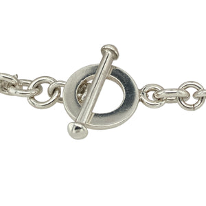 Add airy texture and contemporary style to your collection with this pre-owned 925 silver double round link bracelet—lightweight, modern, and effortlessly elegant.

Design: This 8" bracelet features a striking double round link design, with each cluster of links measuring approximately 2cm across, creating an open and dimensional look.
Material: Made from 925 sterling silver, the polished finish adds a clean, bright shine to the fluid, sculptural design.
