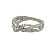 Load image into Gallery viewer, Add modern elegance and graceful sparkle to your collection with this pre-owned 9ct white gold diamond set wrap over band ring—stylish, refined, and perfect for contemporary wear. There is approximately 0.11ct of diamond content set in the band in total.

Design: The ring features a sleek 5mm wide wrap over design across the front of the band, set with diamonds that enhance the flowing shape and add subtle brilliance.

