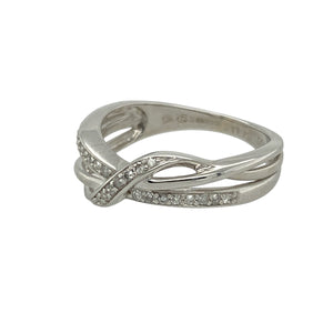 Add modern elegance and graceful sparkle to your collection with this pre-owned 9ct white gold diamond set wrap over band ring—stylish, refined, and perfect for contemporary wear. There is approximately 0.11ct of diamond content set in the band in total.

Design: The ring features a sleek 5mm wide wrap over design across the front of the band, set with diamonds that enhance the flowing shape and add subtle brilliance.
