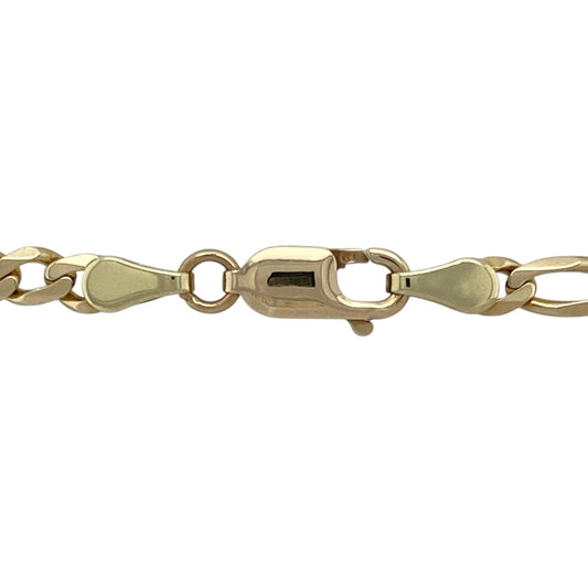 Bring classic style and bold presence to your jewellery collection with this pre-owned 9ct yellow gold Figaro chain, featuring a distinctive link pattern and polished finish—perfect for everyday wear or layering with other favourites.

Design: This 18-inch chain features the traditional Figaro link pattern—three short links followed by one longer link—offering a timeless, textured look. With a 4mm width, it strikes the ideal balance between subtle and statement.
