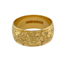 Load image into Gallery viewer, Celebrate rich tradition and bold design with this pre-owned 22ct yellow gold flower patterned band ring—perfect for those who appreciate detailed craftsmanship and lasting elegance.

Design: The ring features a 9mm wide band adorned with an intricate flower pattern, offering a decorative and timeless look with vintage charm.
Material: Made from 22-carat yellow gold, the high-purity metal gives the piece a deep, luxurious hue and a smooth, radiant finish.
