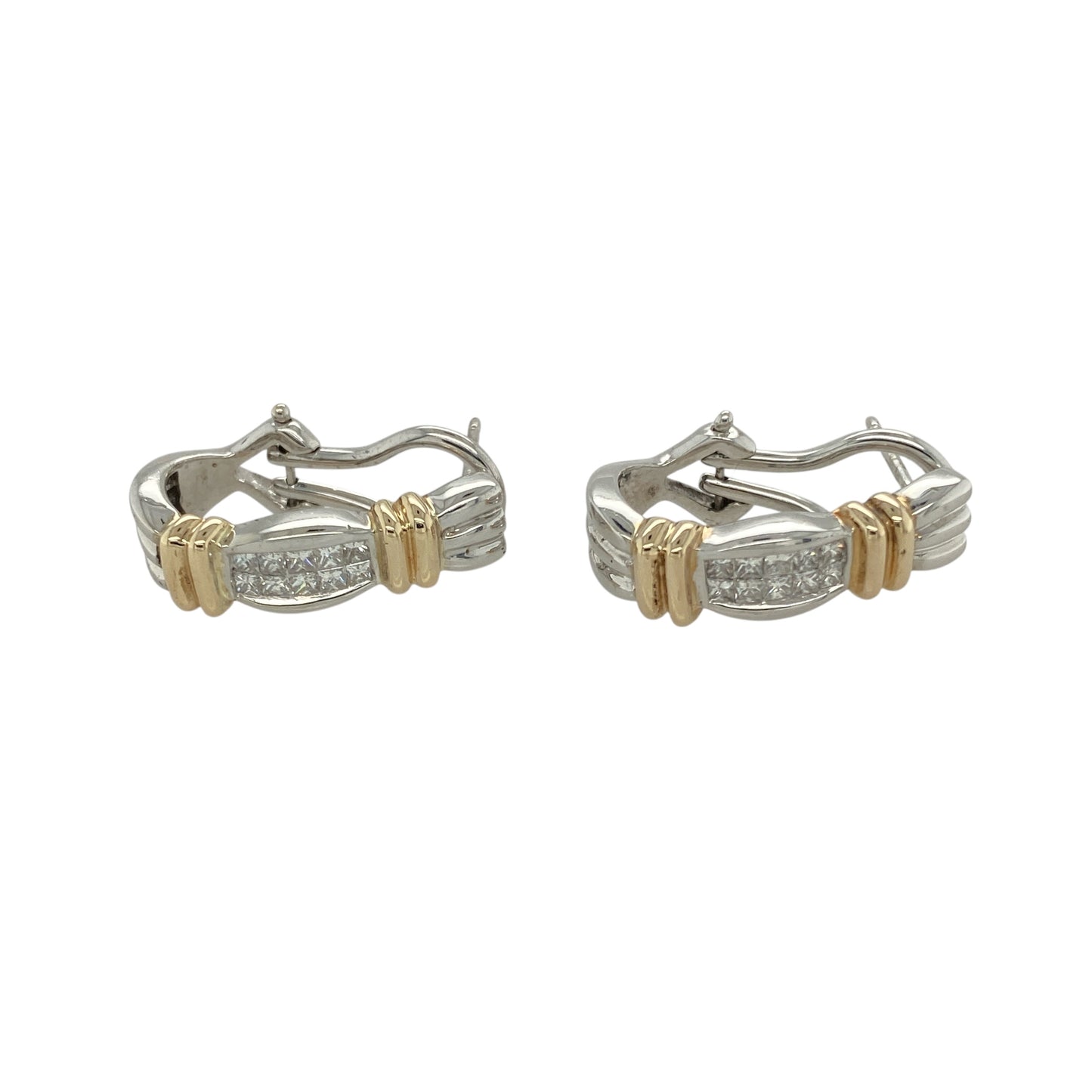 Add modern elegance and two-tone detail to your collection with these pre-owned 9ct white gold diamond set curved half hoop bar stud earrings—perfect for bold styling with refined sparkle.

Design: Each earring features a sleek curved bar design set with sparkling diamonds, accented by polished yellow gold bands that add contrast and visual interest.
Material: Made from 9-carat white and yellow gold, the polished finish highlights the brilliance of the diamonds and the warmth of the yellow gold accents.
