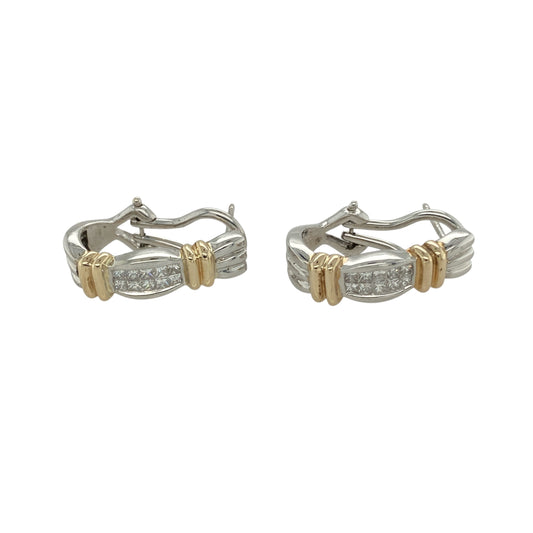 Add modern elegance and two-tone detail to your collection with these pre-owned 9ct white gold diamond set curved half hoop bar stud earrings—perfect for bold styling with refined sparkle.

Design: Each earring features a sleek curved bar design set with sparkling diamonds, accented by polished yellow gold bands that add contrast and visual interest.
Material: Made from 9-carat white and yellow gold, the polished finish highlights the brilliance of the diamonds and the warmth of the yellow gold accents.
