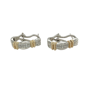 Add modern elegance and two-tone detail to your collection with these pre-owned 9ct white gold diamond set curved half hoop bar stud earrings—perfect for bold styling with refined sparkle.

Design: Each earring features a sleek curved bar design set with sparkling diamonds, accented by polished yellow gold bands that add contrast and visual interest.
Material: Made from 9-carat white and yellow gold, the polished finish highlights the brilliance of the diamonds and the warmth of the yellow gold accents.
