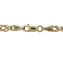 Load image into Gallery viewer, Add heritage design and bold style to your collection with this pre-owned 9ct yellow gold 16&quot; Celtic knot link chain—perfect for standout elegance with symbolic flair.

Design: The chain features intricate 4mm wide Celtic knot links, offering a rich, interwoven pattern that reflects timeless craftsmanship and cultural symbolism.
Material: Made from 9-carat yellow gold, the polished finish enhances the detailed links with a warm, radiant glow.

