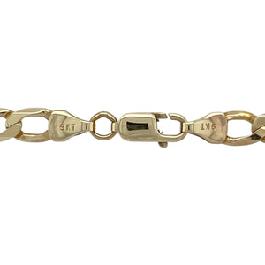 Add bold elegance and classic strength to your collection with this pre-owned 9ct yellow gold 22" curb chain—perfect for confident styling with timeless appeal.

Design: The chain features a 5mm wide curb link pattern, offering a solid, flat profile with clean lines and a traditional look.
Material: Made from 9-carat yellow gold, the polished finish enhances the bold links with a rich, golden glow.

