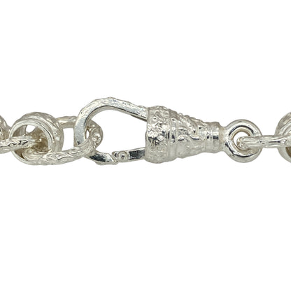 Bring timeless design and detailed craftsmanship to your jewellery collection with this new 925 silver 9" patterned engraved rollerball bracelet—a bold and elegant piece with vintage-inspired appeal.

Design: Featuring 10mm wide rollerball-style links, the bracelet alternates between smooth polished links and finely engraved patterns, creating a refined and eye-catching contrast.
