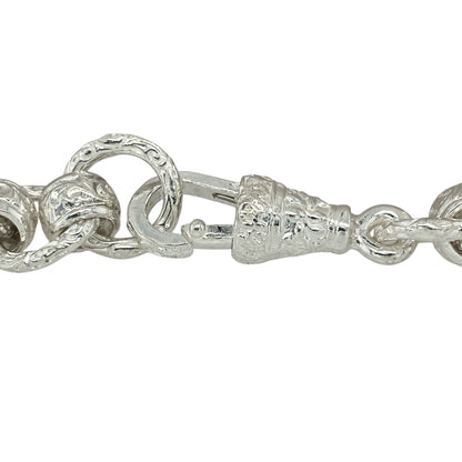 Bring vintage character and bold detail to your jewellery collection with this new 925 silver 8.5" patterned engraved rollerball bracelet—a substantial piece combining timeless design with intricate craftsmanship.

Design: Featuring 10mm wide rollerball-style links, the bracelet alternates between polished and intricately engraved links, creating a classic yet distinctive look.
