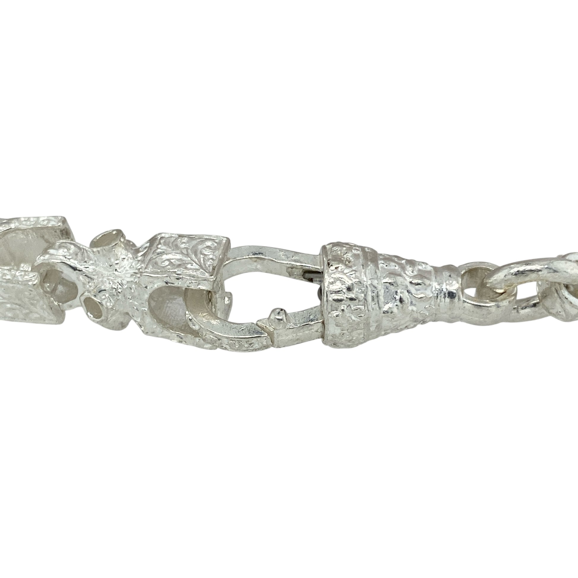 Bring structured style and playful detail to your jewellery collection with this new 925 silver 8" patterned Lego link bracelet—a bold, modern piece with unique character and clean design.

Design: Featuring 6mm wide Lego-inspired links with subtle patterning, this bracelet offers a geometric, contemporary look with a creative twist.
Material: Made from solid 925 sterling silver, the polished finish highlights the crisp edges and engraved details for a refined shine.
