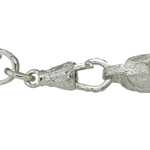 Bring floral elegance and bold texture to your jewellery collection with this new 925 silver 7.75" patterned tulip link bracelet—a striking piece that blends natural inspiration with intricate design.

Design: Featuring 12mm wide tulip-shaped links with detailed patterning, this bracelet offers a bold yet graceful look inspired by flowing floral forms.
Material: Made from solid 925 sterling silver, the polished finish enhances the textured surfaces and brings out the depth of the patterned links.
