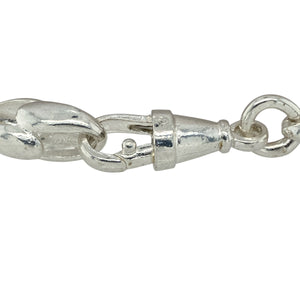 Bring sleek simplicity and elegant form to your jewellery collection with this new 925 silver 8" plain tulip link bracelet—a timeless piece with graceful curves and polished shine.

Design: Featuring 8mm wide tulip-shaped links in a smooth, unpatterned finish, this bracelet offers a clean and fluid silhouette with a classic floral-inspired touch.
Material: Made from solid 925 sterling silver, the high-polish surface provides a bright, reflective shine that enhances the bracelet’s flowing design.
