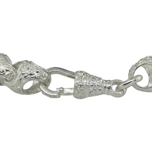 Bring natural texture and refined boldness to your jewellery collection with this new 925 silver 9" patterned acorn link bracelet—a distinctive piece inspired by organic form and classic silverwork.

Design: Featuring 11mm wide acorn-inspired links with detailed patterning, this bracelet combines nature-inspired design with a bold, structured silhouette.
Material: Made from solid 925 sterling silver, the polished and textured finish highlights the intricate detailing and adds a rich, dimensional shine.
