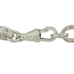Bring classic sophistication and sparkling detail to your jewellery collection with this new 925 silver & cubic zirconia set 9" patterned belcher bracelet—a bold and timeless piece with refined texture and shine.

Design: Featuring 11mm wide patterned oval links adorned with cubic zirconia, this bracelet offers a traditional belcher style elevated by intricate detailing and subtle brilliance.
