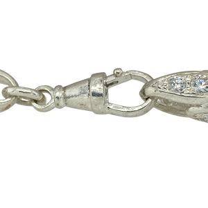 Bring floral elegance and subtle sparkle to your jewellery collection with this new 925 silver & cubic zirconia set 8" tulip link bracelet—a graceful piece with natural inspiration and refined shine.

Design: Featuring 10mm wide tulip-shaped links accented with cubic zirconia, this bracelet blends botanical curves with a touch of shimmering detail.
Material: Made from solid 925 sterling silver, the polished finish enhances the flowing design and highlights the brilliance of the stones.

