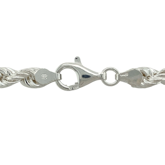 Bring timeless texture and polished shine to your jewellery collection with this new 925 silver 26" rope chain—a bold classic with enduring appeal and structured elegance.

Design: Featuring 7mm wide rope-style links, this chain showcases a twisted, woven look that adds movement and depth to its design.
Material: Made from solid 925 sterling silver, the high-polish finish enhances the rope texture for a brilliant, eye-catching shine.