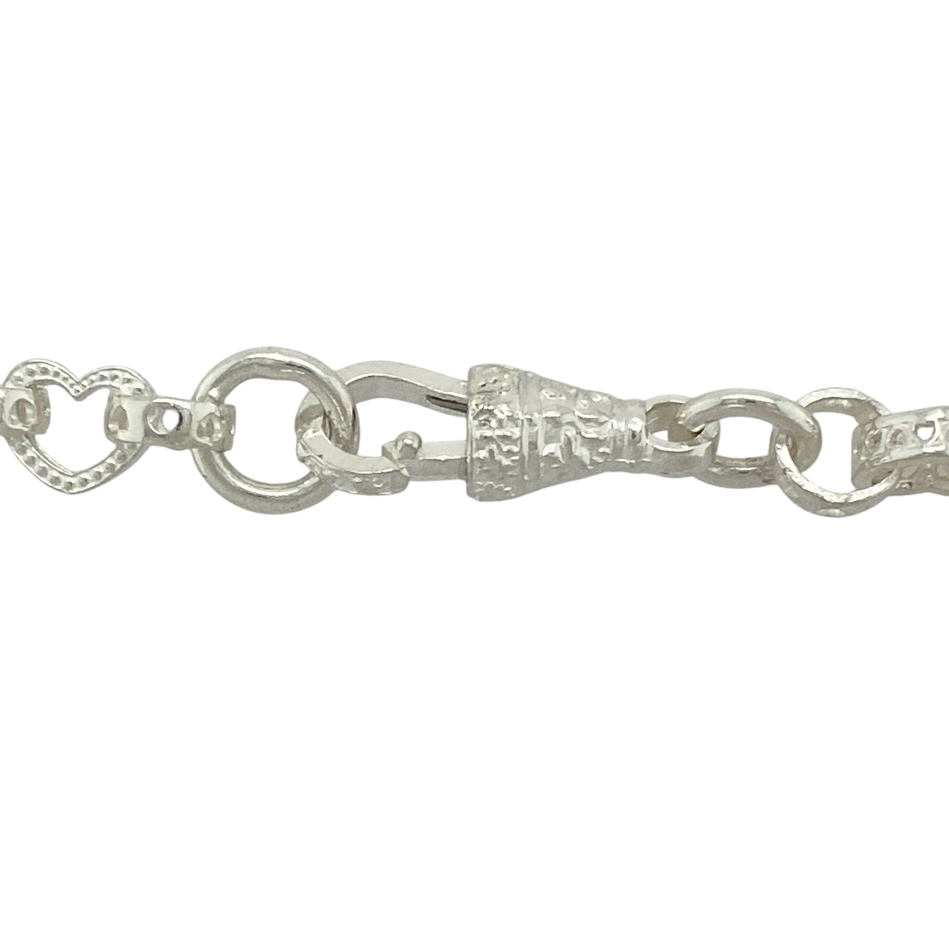Bring delicate charm and symbolic detail to your jewellery collection with this new 925 silver 26.5" patterned heart link chain—a graceful piece with romantic styling and timeless appeal.

Design: Featuring 7mm wide heart-shaped links with subtle patterned engraving, this chain offers a soft yet structured look with sentimental elegance.
Material: Made from solid 925 sterling silver, the polished and engraved finishes enhance the gentle curves and detail of each link.
